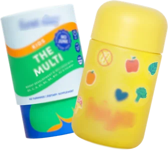 Two kids’ multivitamin jars, blurred