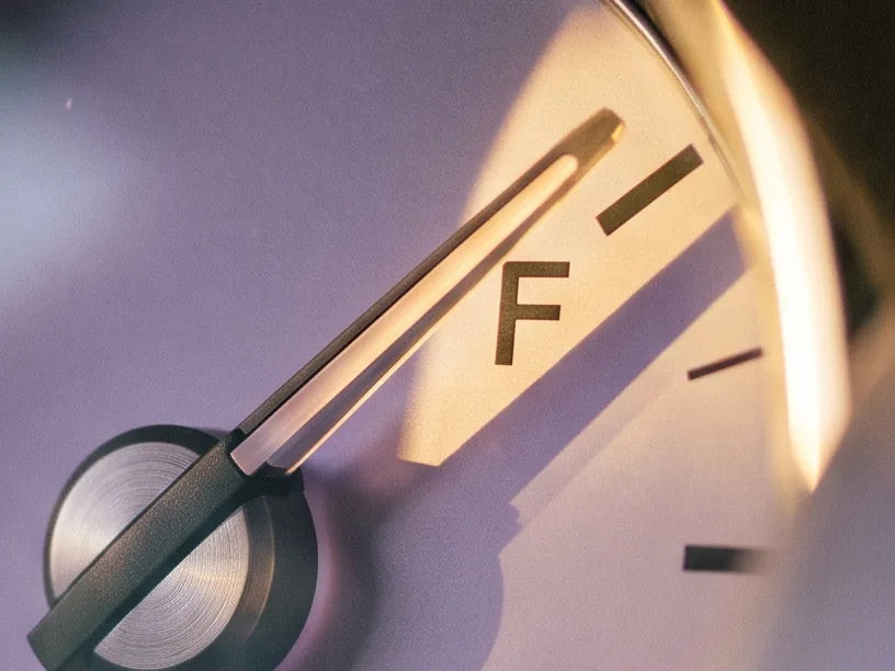 Fuel gauge needle on full in morning light